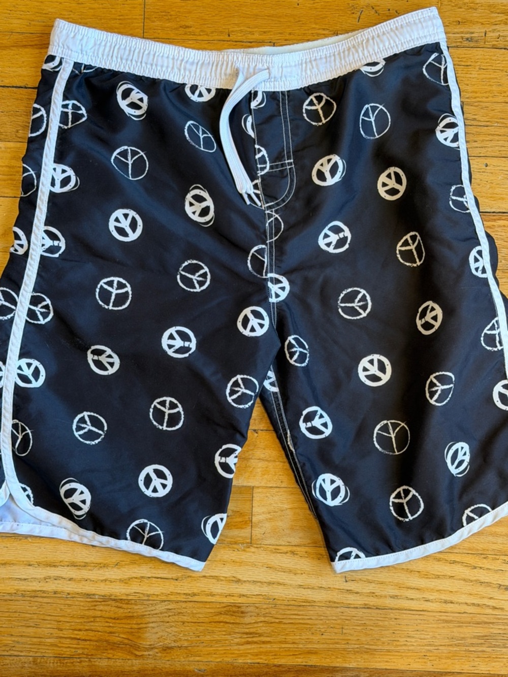 Kids Black Swim Trunks with White Peace Sign Print